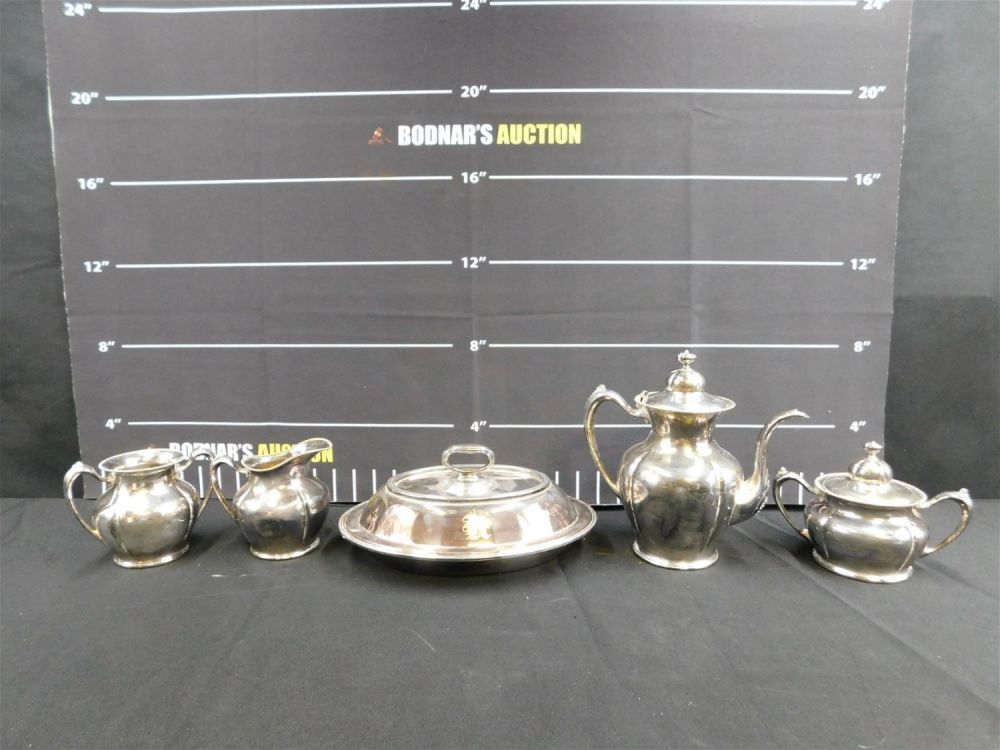 Lot 212: Grouping of Silverplate - Tea Set and Vegetable Dish