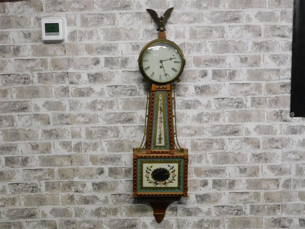 Lot 193: Reverse Painted Banjo Clock