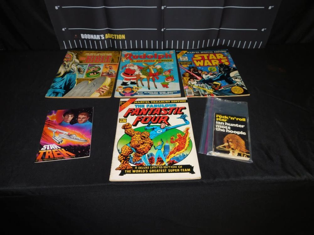 Lot 243: Mixed Lot of Treasury Sized Comics and Books
