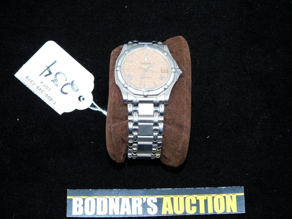 Lot 234: Concord Saratoga SL Quartz 34mm