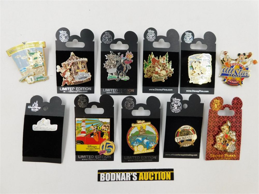 Lot 173: Lot of 11 Disney Resorts Pins