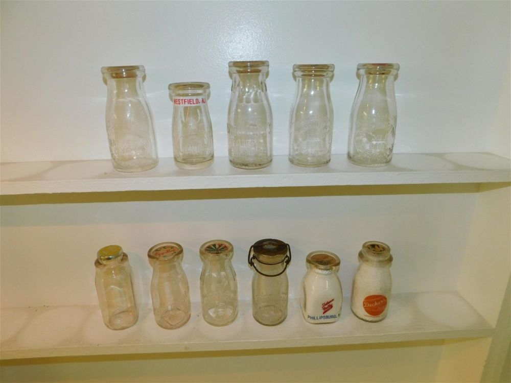 Lot 164: Lot of 11 New Jersey Cream Bottles