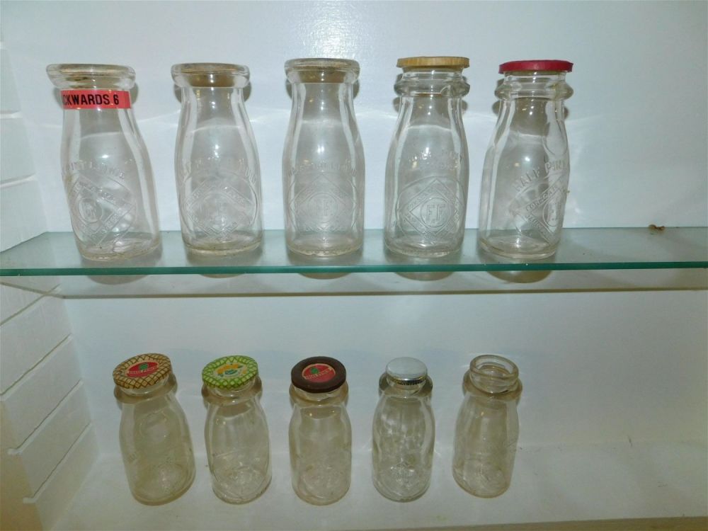 Lot 216: Lot of 10 NJ Cream Bottles