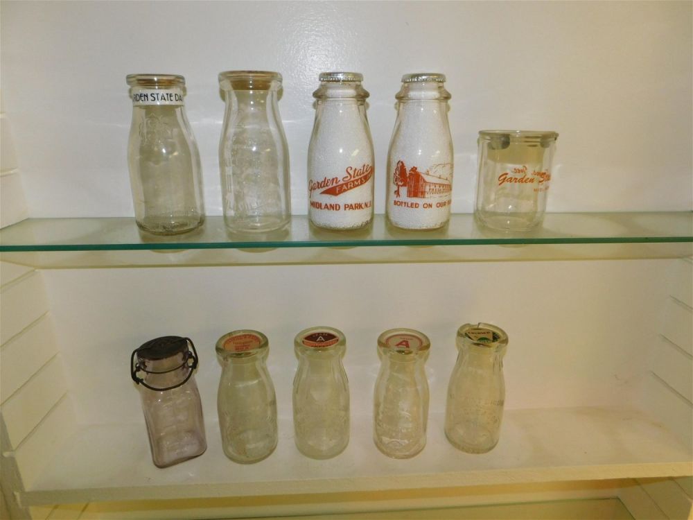 Lot 234: Lot of 10 NJ Cream Bottles