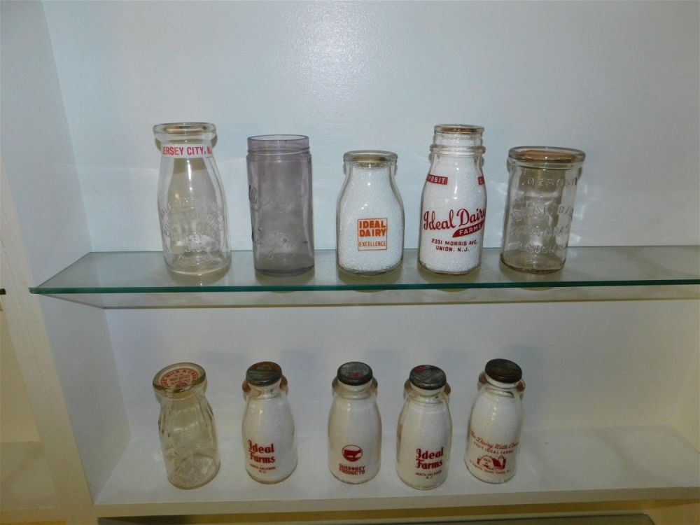 Lot 302: Lot of 10 NJ Cream Bottles