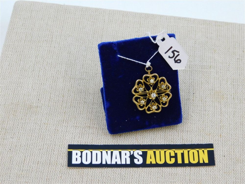 Lot 156: 14 KT. and Diamond Pendant/Pin