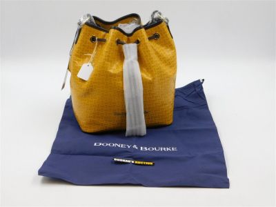 Dooney & Burke Handbag. Dooney &amp; Burke Handbag. Yellow Woven Pattern. Tassel Closure. New 
