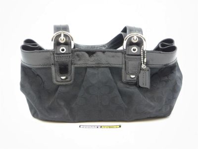 Coach Black Cloth Handbag. Used - Good Condition. Very Little Wear. Clean interior. Measures 7" 