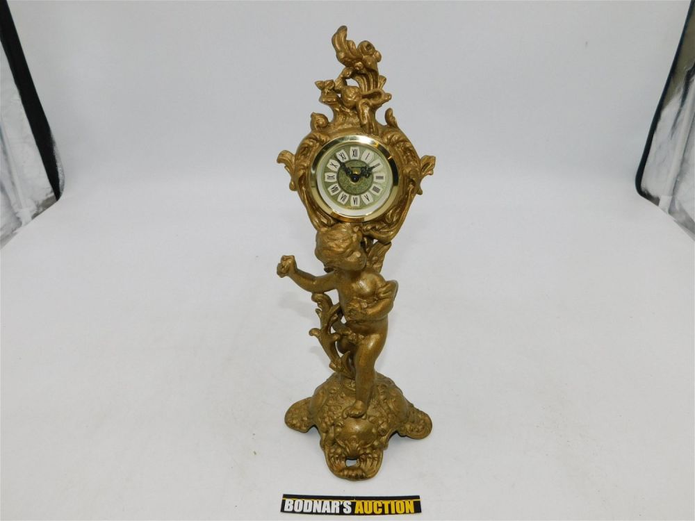 Lot 157: Figural Cherub Pot Metal Desk Clock