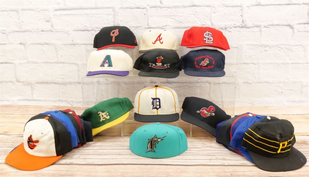 Lot 212: Enormous Lot of Baseball  Snap Back and Fitted Hats