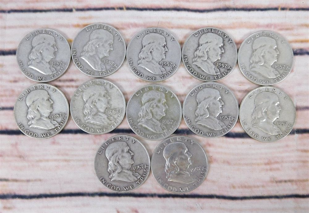 Lot 168: Group of Benjamin Franklin Half Dollars