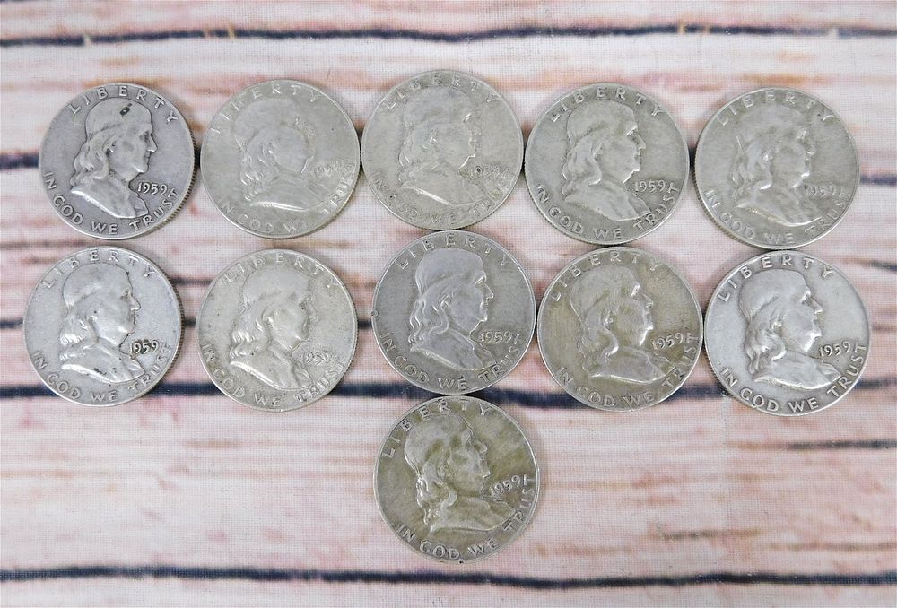 Lot 171: Group of Benjamin Franklin Half Dollars