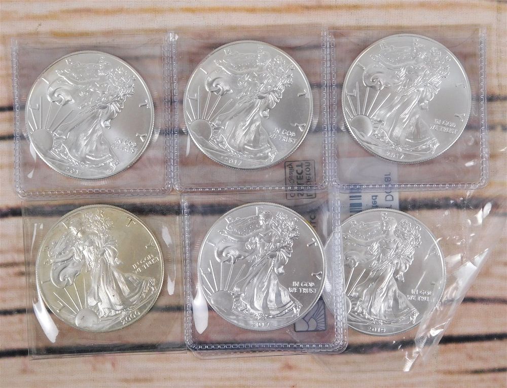 Lot 197: 6 Walking Liberty Silver Dollars