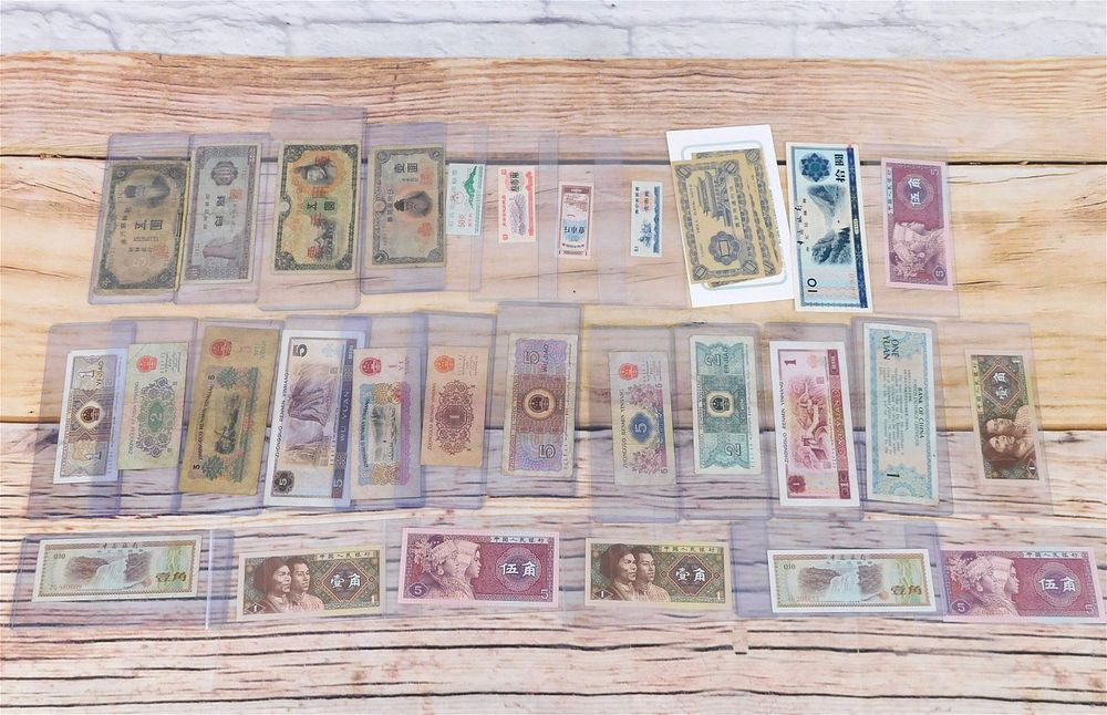 Lot 213: Group of Foreign Currency