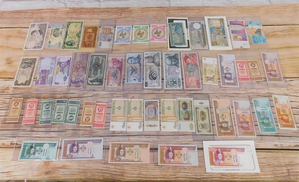 Lot 215: Group of Foreign Currency
