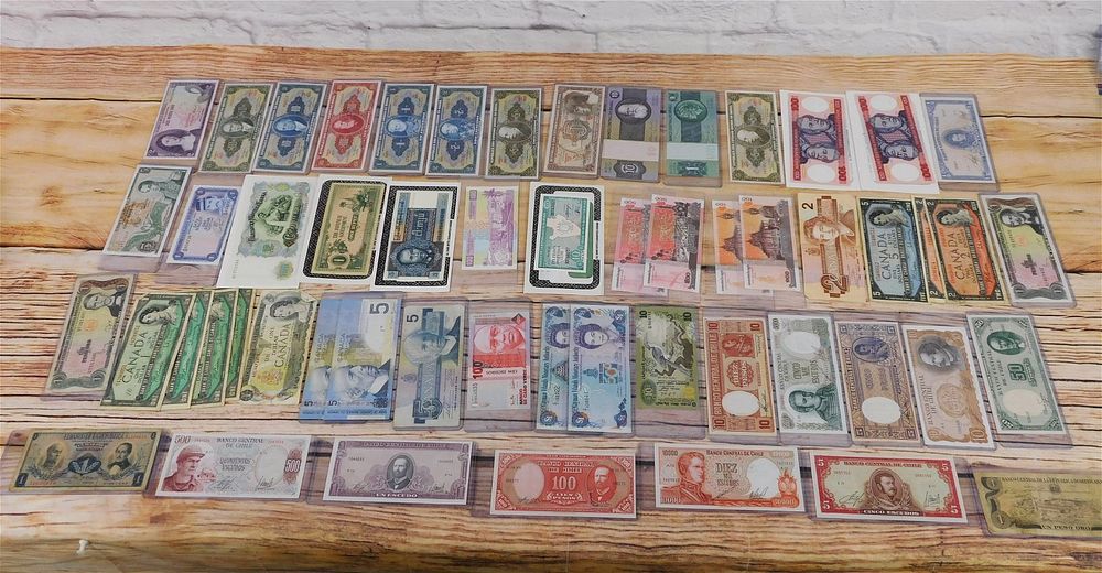 Lot 219: Group of Foreign Currency