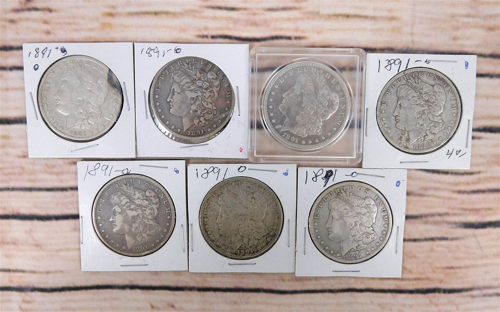 Lot 237: 8 1891 O Morgan Silver Dollars