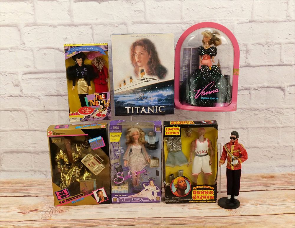 Lot 302: Lot of Character Dolls