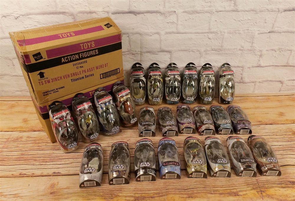 Lot 155: Lot of 24 Star Wars Titanium Series 3" Vehicle Packs