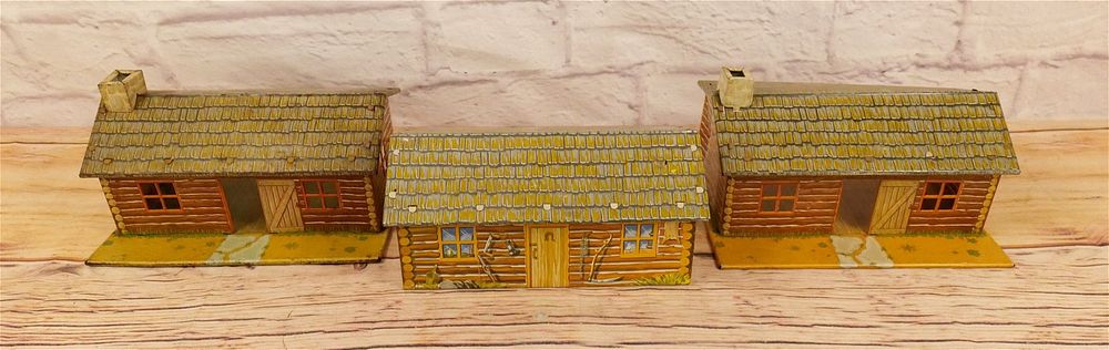 Lot 174: Lot of 3 Marx Tin Litho Apache Cabins