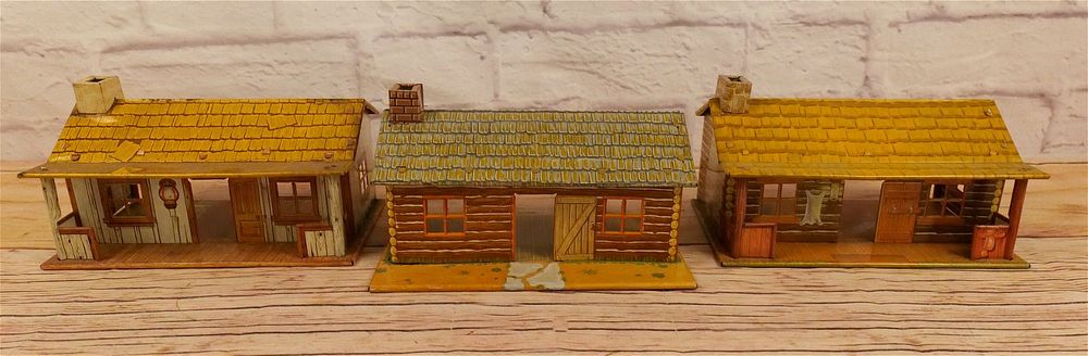 Lot 175: Lot of 3 Marx Tin Litho Cabins