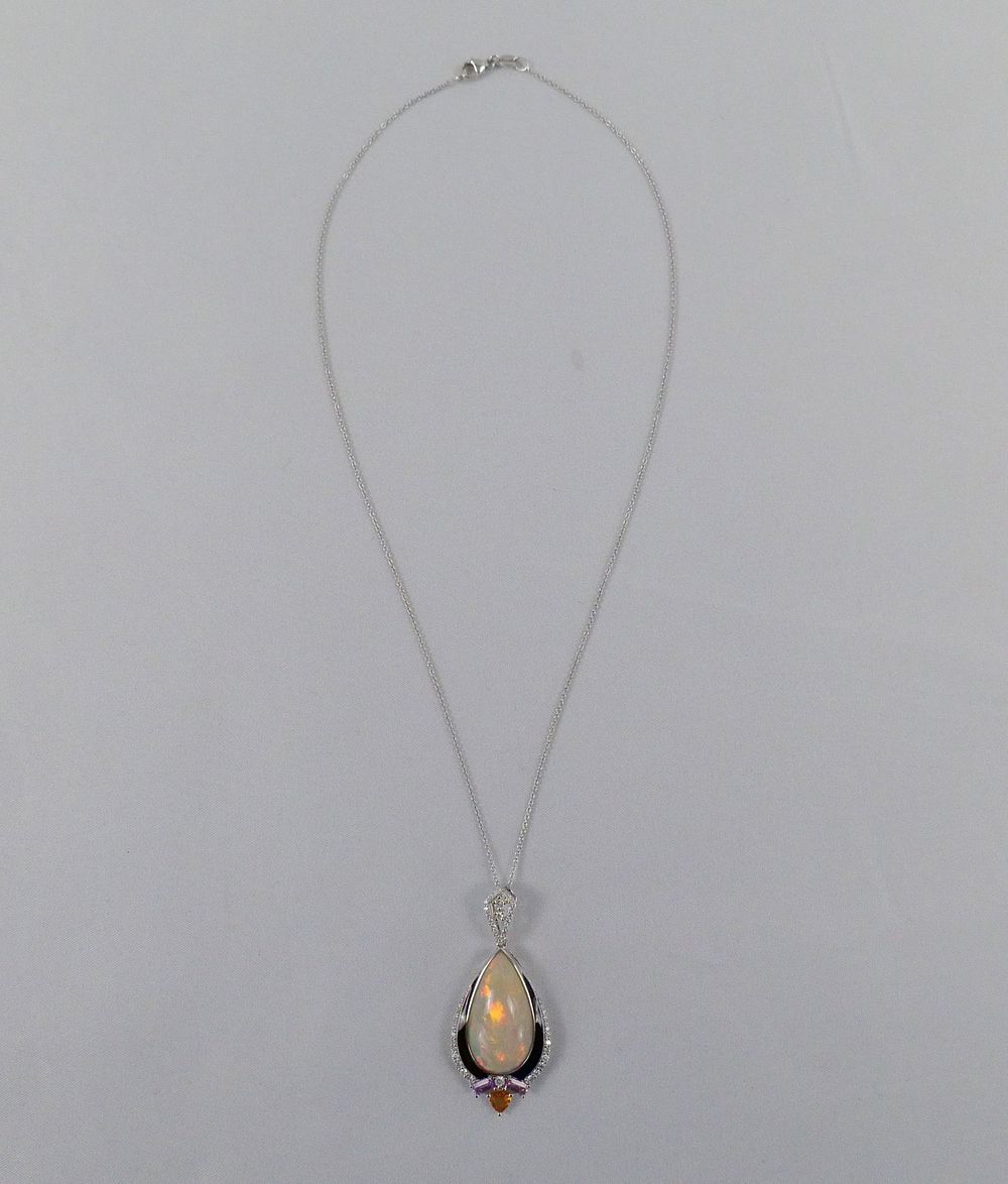 Lot 158: Platinum Opal, Sapphire Corundum and Diamond Pendent with Chain