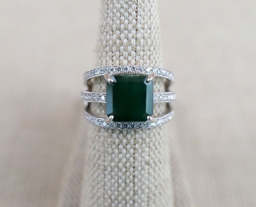 Lot 162: Oscar Friedman 18K Emerald and Diamond Ring