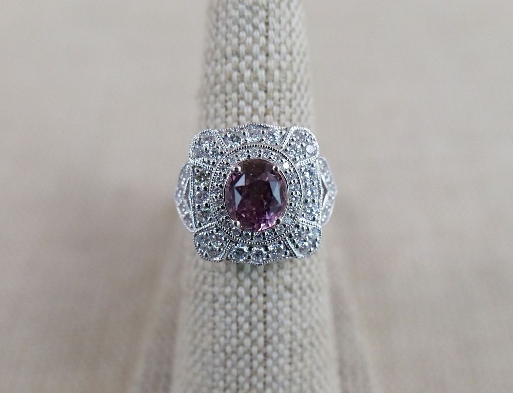 Lot 164: Oscar Friedman Platinum Sapphire and Diamond Ring
