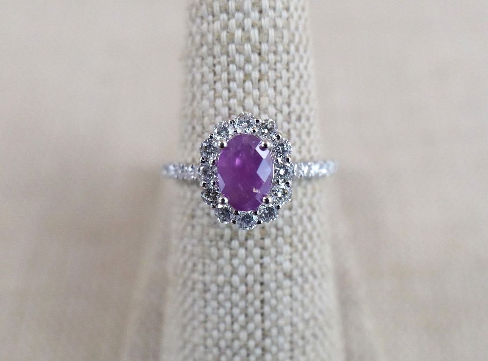 Lot 165: Oscar Friedman Platinum Kashmir Sapphire and Diamond Ring
