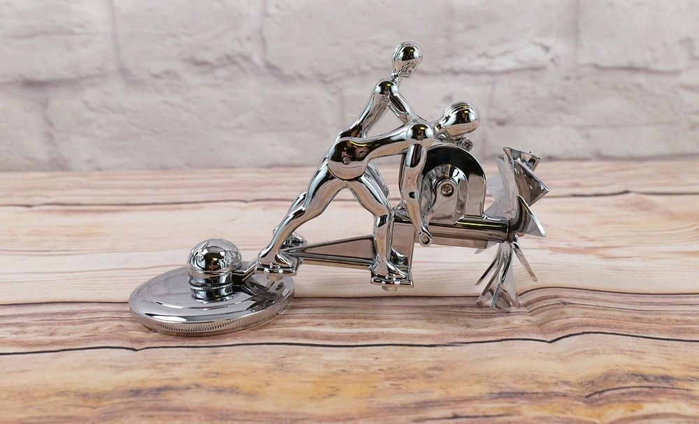 Lot 230: 1921 Liberty Action Twins Art Deco Hood Ornament