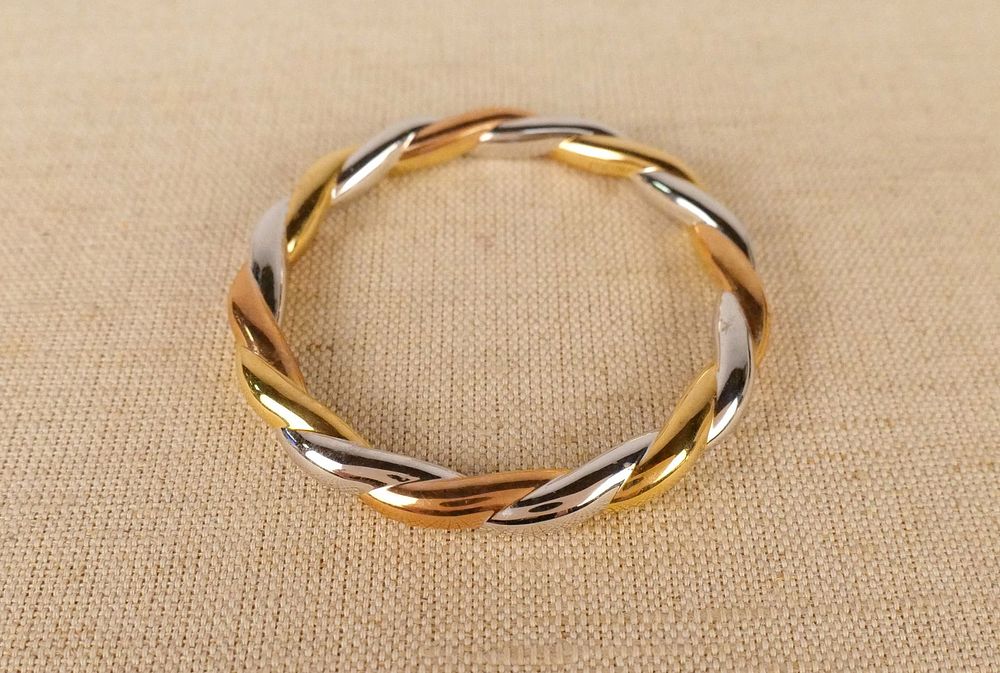 Lot 218: 14K Tri-Colored Bangle