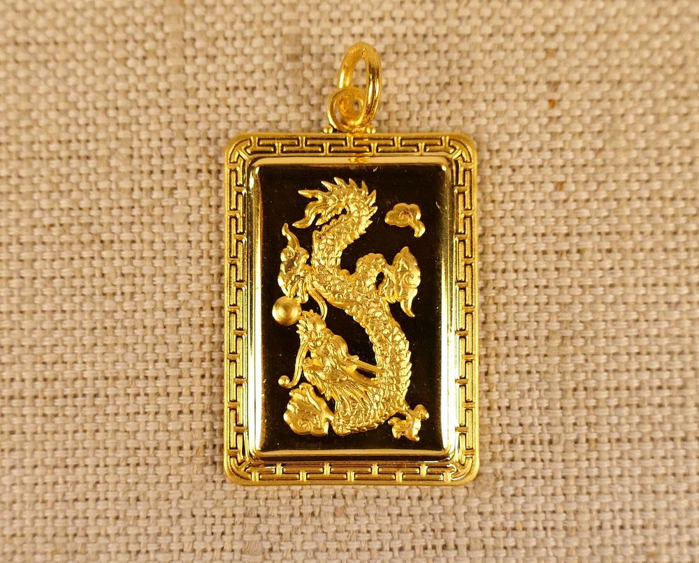 Lot 265: Chinese 24K Yellow Gold Blessing Pendant