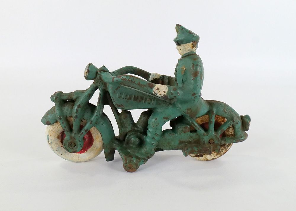 Lot 183: Cast Iron Champion Motorcycle Police Officer
