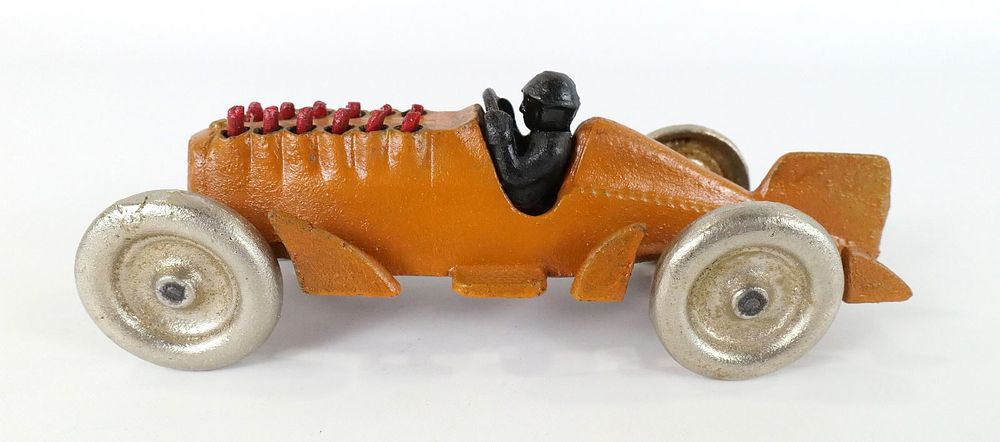 Lot 187: Cast Iron Mechanical Piston Toy Race Car