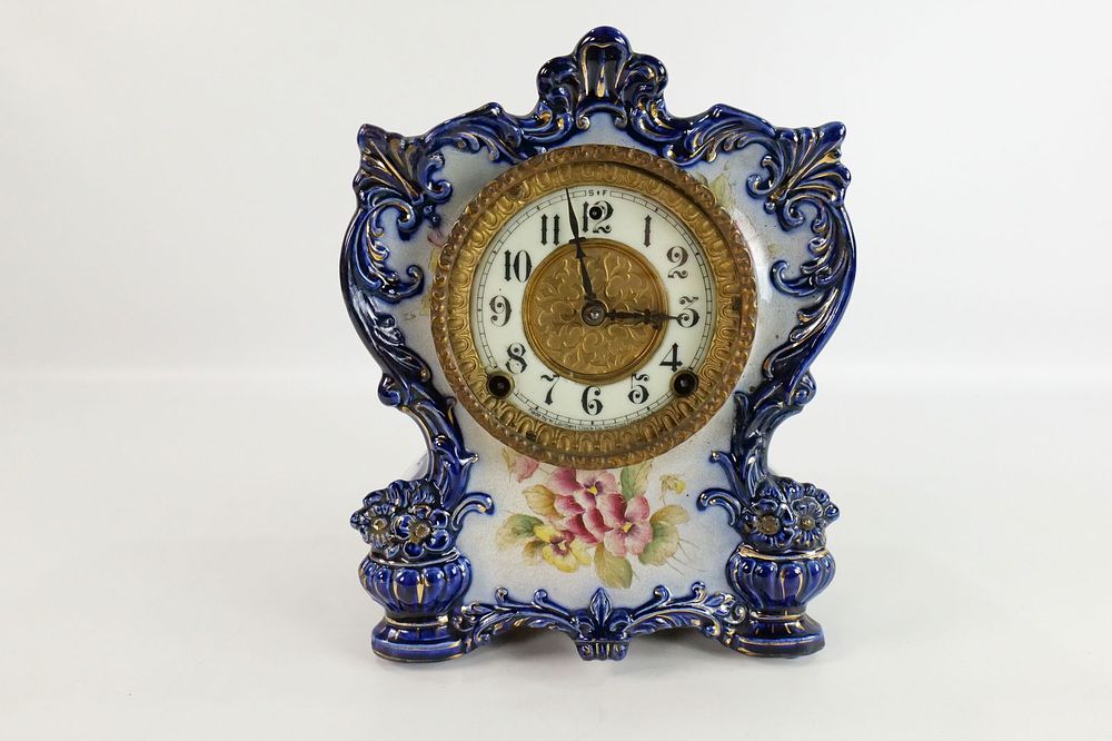 Lot 187: Antique Porcelain Mantle Clock