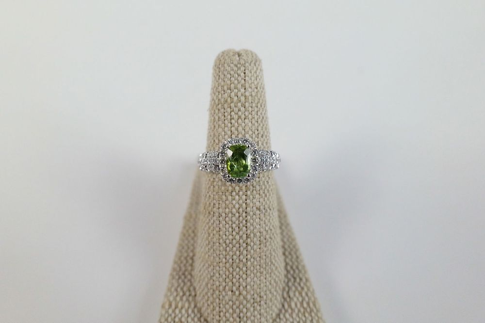 Lot 203: Platinum Diamond and Tourmaline Ring