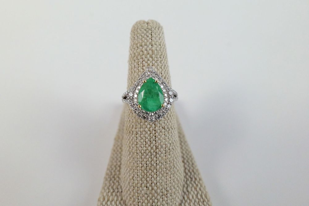 Lot 206: 18K Emerald and Diamond Ring