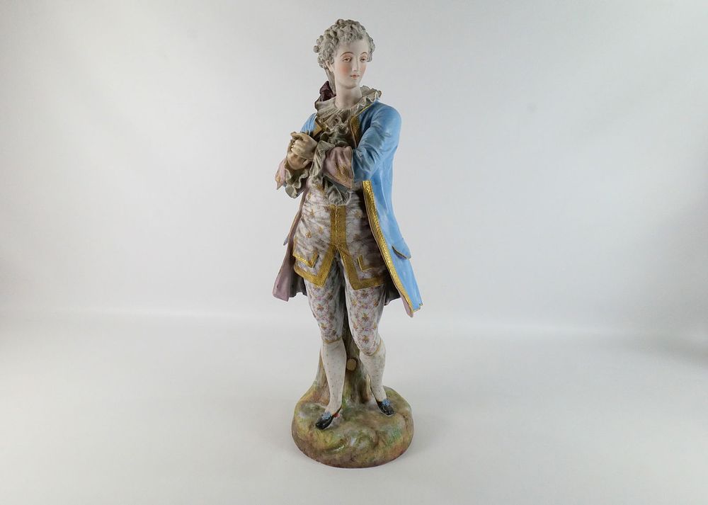Lot 252: 19th Century Porcelain and Bisque Statue
