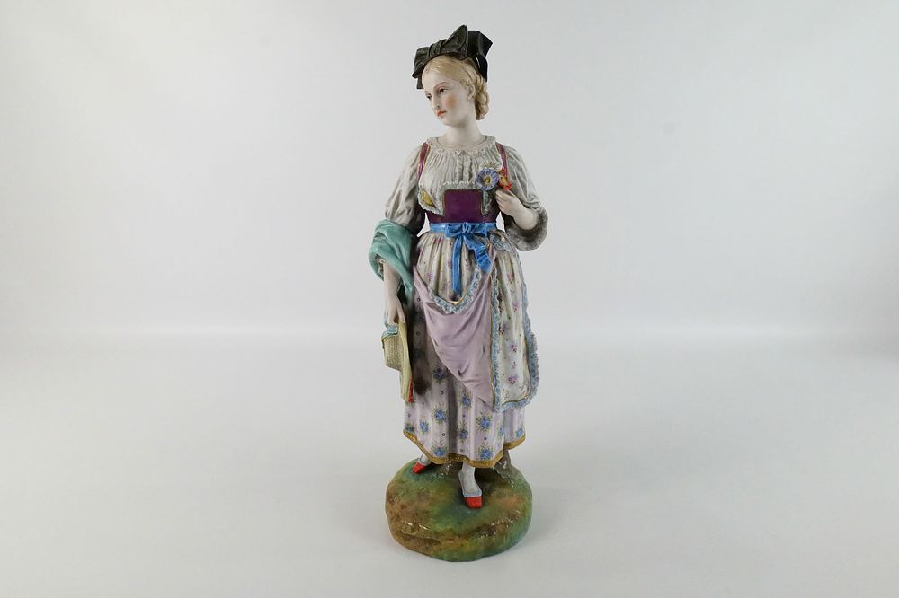 Lot 253: 19th Century Bisque and Porcelain Hand Painted Statue