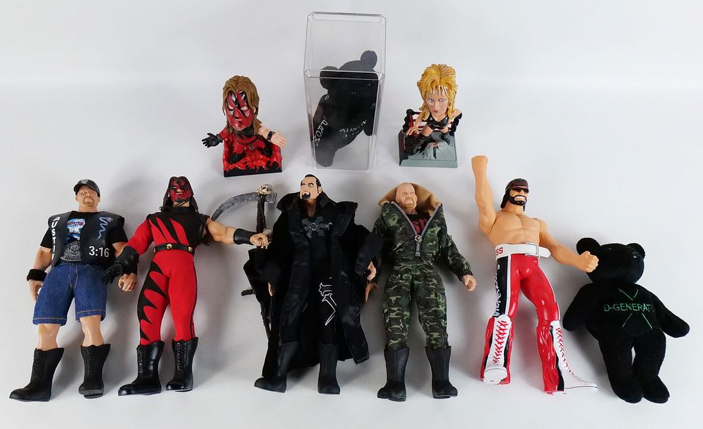 Lot 249: Group Lot of Loose Wrestling Collectibles
