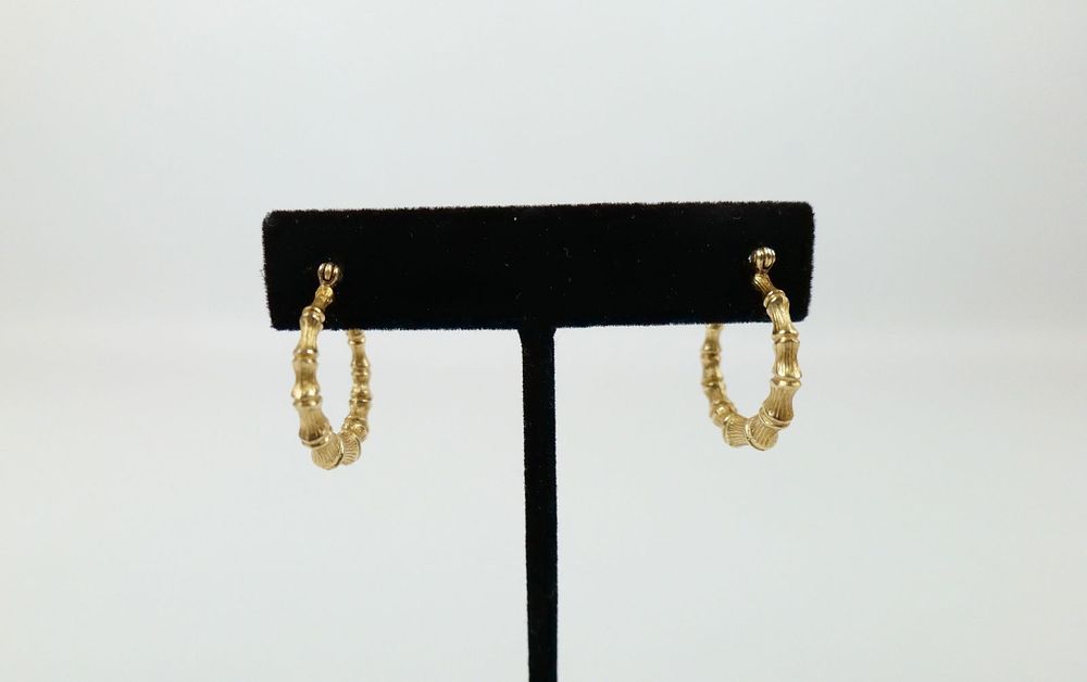 Lot 278: 14K Hollow Bamboo Hoop Earrings