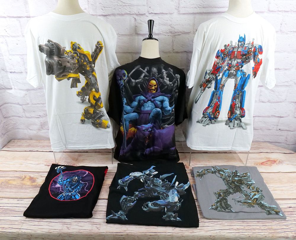 Lot 338: Lot of 6 MOTU and Transformers Shirts