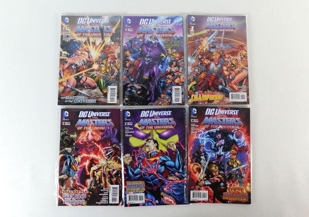 Lot 156: Lot of DC Universe vs. Masters of the Universe Comics