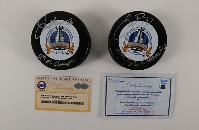 Lot of 2 New York Rangers Signed Stanley Cup Hockey Pucks. Lot of 2 New York Rangers Signed 