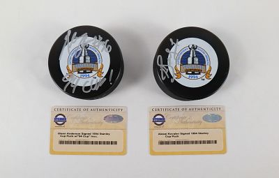 Lot of 2 New York Rangers Signed Stanley Cup Hockey Pucks. Lot of 2 New York Rangers Signed 