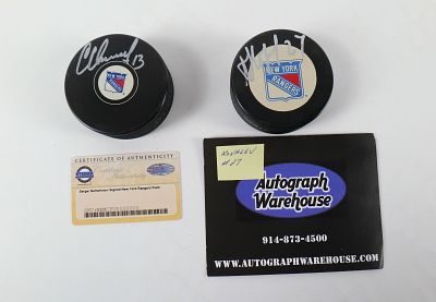 Lot of 2 New York Rangers Signed Hockey Pucks. Including Sergei Nemchinov with Steiner Sports 