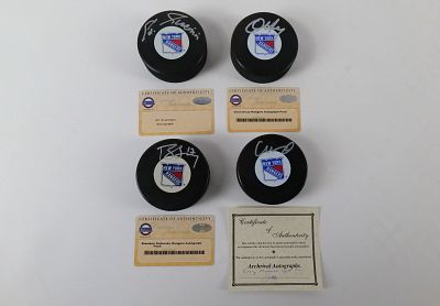 Lot of 4 New York Rangers Autographed Hockey Pucks. Including Craig MacTavish with Archrival 