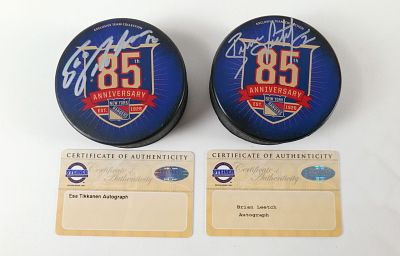 Lot of 2 New York Rangers 85th Anniversary Autographed Hockey Pucks. Including Brian Leetch and 