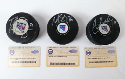 Lot of 3 New York Rangers Autographed Hockey Pucks. Including Derick Brassard, Martin St. Louis 