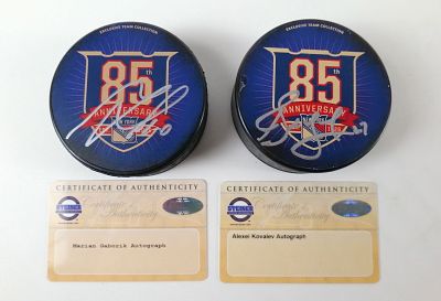 Lot of 2 New York Rangers 85th Anniversary Autographed Hockey Pucks. Including Alexei Kovalev 